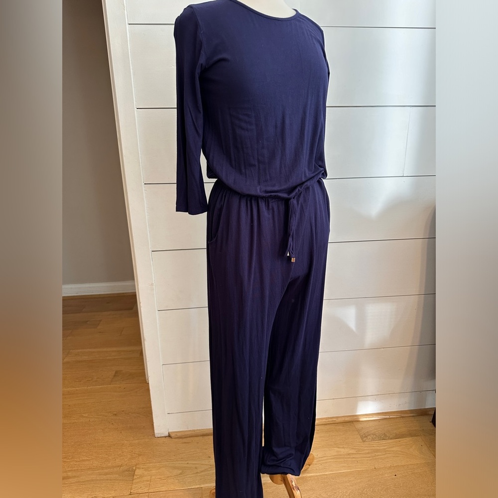 Long sleeve navy jumpsuit.